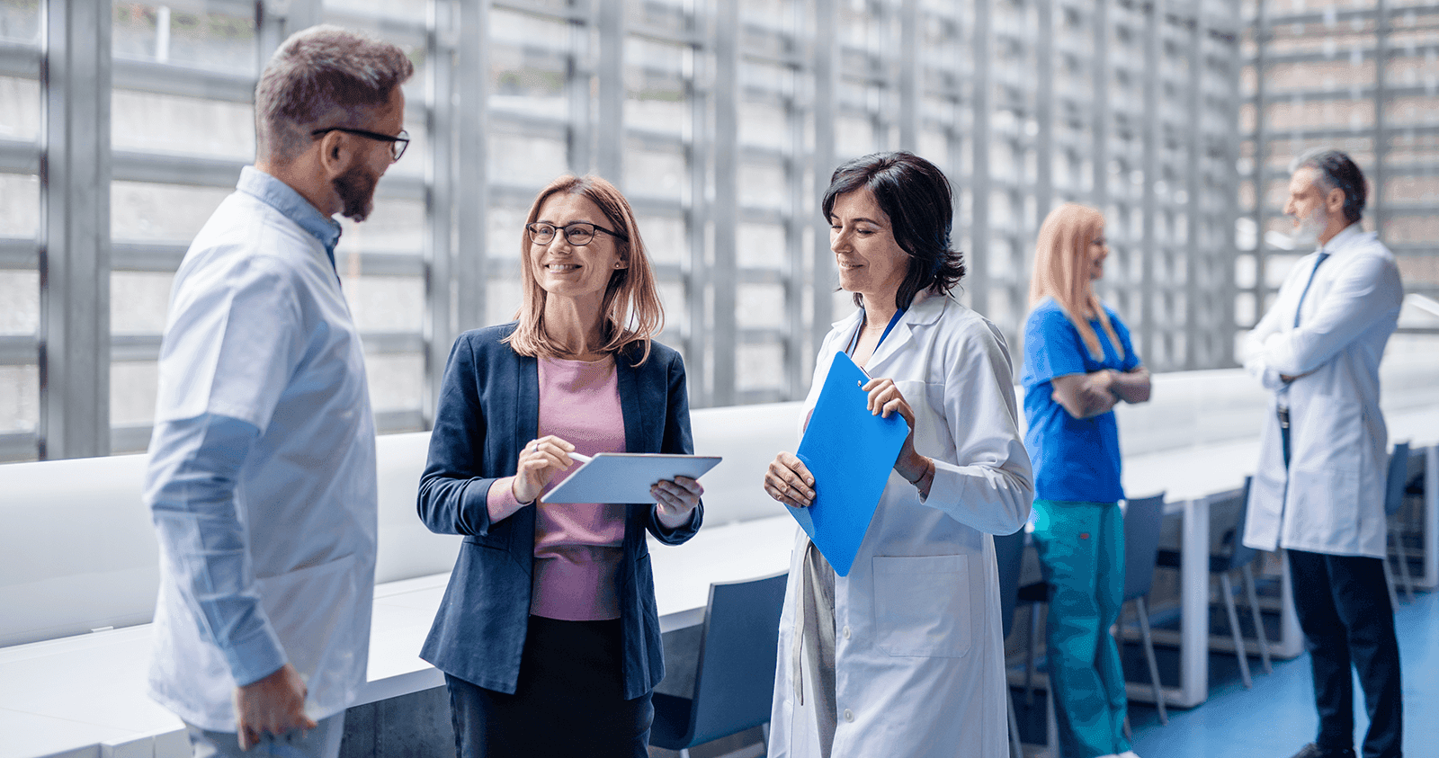 Medical contract sales representatives meeting healthcare professionals
